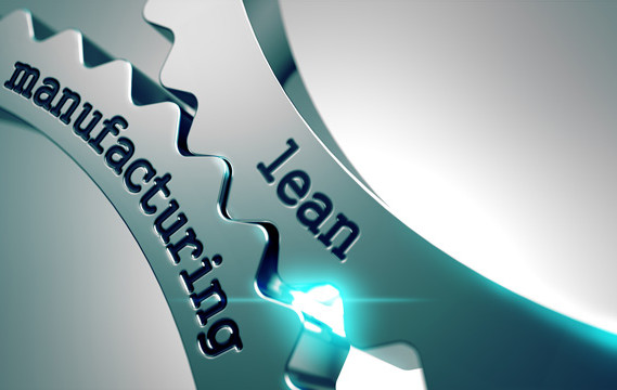 Two silver gears meshing together